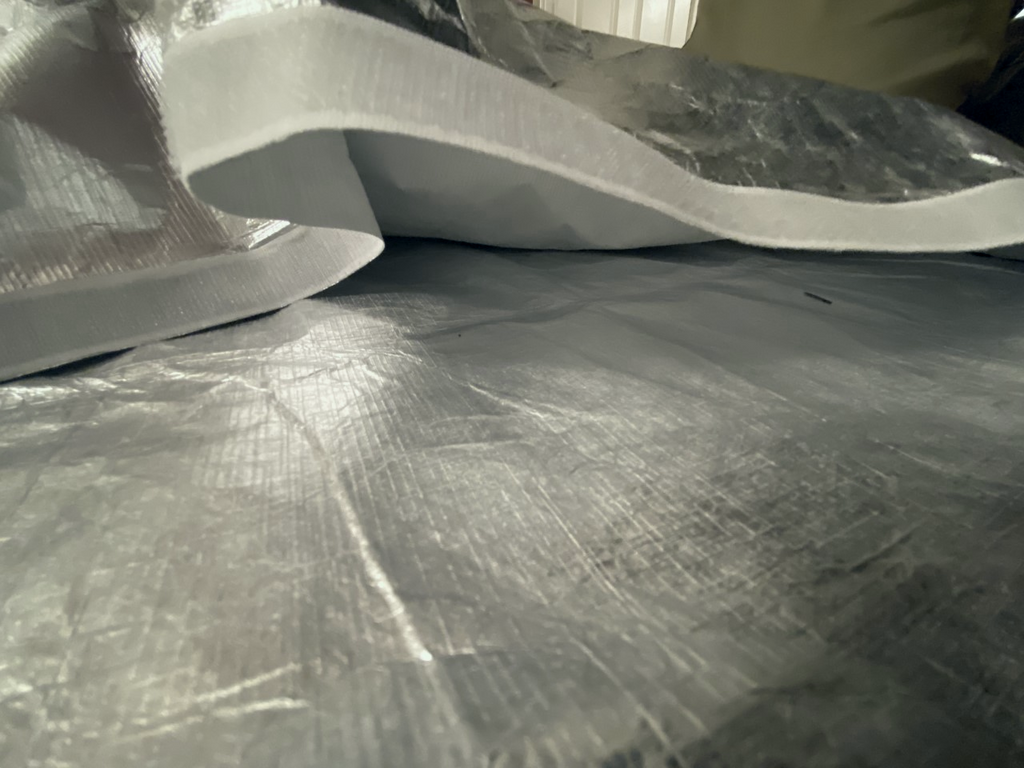 v2 R.E. Cover showing both reflective layers